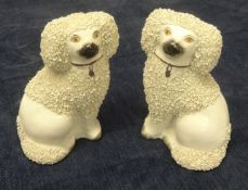 A pair Staffordshire dogs with encrusted decoration, height 12cm also an oil lamp (3).