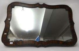 A early 20th Century mahogany framed wall mirror, overall size approx 103cm x 70cm.