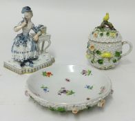 A 19th Century porcelain chocolate cup, cover and dish encrusted with flowers, mounted with a bird