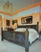 A heavy and large carved oak King-size plus double bed, width 77 inches.