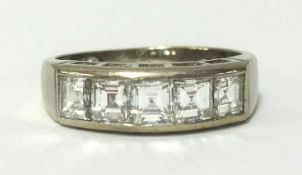 An 18ct white gold and diamond set five stone ring, the square cut diamonds weighing approx 1.36cts,