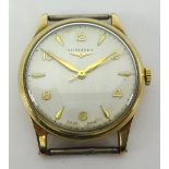 Longines, a gents 8ct gold traditional wristwatch, with Arabic and baton numerals, with no strap.