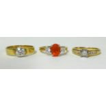 18ct gold band ring set with a diamond, an 18ct diamond princess cut ring and a citrine?