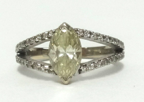 A fine 18ct diamond fancy yellow cluster ring, the centre marquis cut diamond approx 1.03cts,