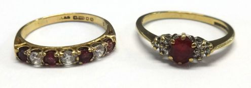A 9ct six stone dress ring and another (2).