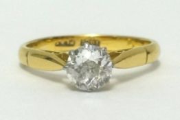 A 18ct diamond solitaire ring, the single stone approx 0.75ct, finger size L1/2.