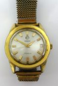 Rado, a gents star liner gilt wristwatch with date window, case no 59948 with expanding bracelet.