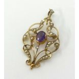 An antique 9ct gold amethyst and seed pearl pendant of Art Nouveau design approx 4.1gms.