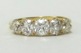 An 18ct gold diamond 5 stone ring set with graduated old cut diamonds, gross weight approx 1.40ct,