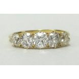 An 18ct gold diamond 5 stone ring set with graduated old cut diamonds, gross weight approx 1.40ct,