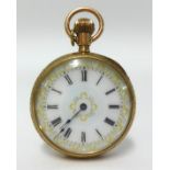 A Victorian ladies gold cased fob watch with a pretty enamel and gilt dial, set with roman numerals,