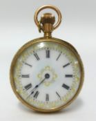A Victorian ladies gold cased fob watch with a pretty enamel and gilt dial, set with roman numerals,