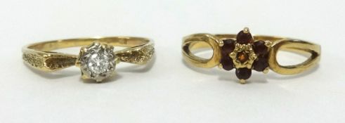 Two 9ct gold dress rings, one set with diamonds, the other garnet, gross weight 3.2gms.
