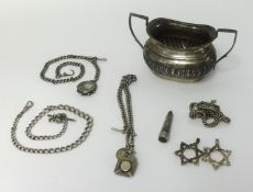 A silver sucre with half fluted body also three silver Alberts, two Maltese crosses and a white