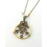 A 9ct gold and seed pearl necklace of flower spray design on a fine chain approx 4.5gms.