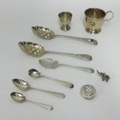 A silver egg cup, a silver cup, a silver pill box, also a pair of Georgian silver and bright cut