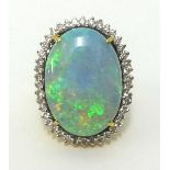 An impressive 18ct gold large opal and diamond cluster ring, approx 28mm x 20mm, finger size O.