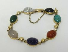 A modern South African semi precious stone bracelet set in 9ct gold.