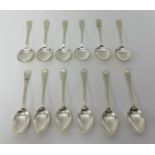 A set of George V silver flatware by James Dickson, comprising six soup spoons, six dessert