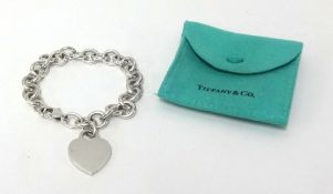 Tiffany, a silver bracelet with heart pendant and bar, approx 76gms with box.