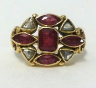 A 14k ruby and diamond ring, finger size K/L.