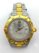 Tag Heuer, a ladies 18ct gold and stainless steel Aquaracer wristwatch with original box, outer box,