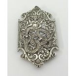 A ornate Indian white metal silver? belt buckle, approx 95mm x 50mm.