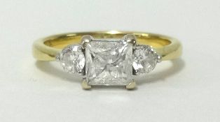 An 18ct yellow gold diamond 3 stone ring, finger size M, set with princess and round cut diamonds.