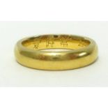 A 22ct gold wedding band, finger size J, approx 6.5gms.