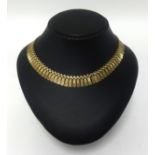 A 9ct gold fringe necklace, approx 19.60gms