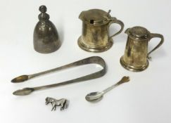 A small silver shaker (TB and S), a silver brooch, a silver mustard pot with blue glass liner (TB