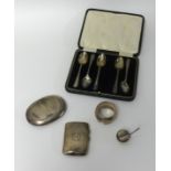 Various silverwares including five silver teaspoons, cigarette case, polish box, a napkin ring and a