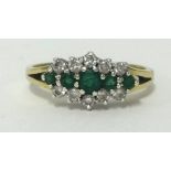 A 9ct emerald cluster, finger size P