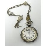 A Victorian silver open face pocket watch with decorative dial, key wined movement.