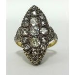 A fine antique 18ct diamond marquise shaped cluster ring, set with 17 old cut diamonds, with a total