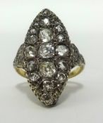 A fine antique 18ct diamond marquise shaped cluster ring, set with 17 old cut diamonds, with a total
