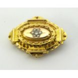 A antique 15ct gold diamond and pearl set brooch, approx 37mm wide, the reverse with hair lock