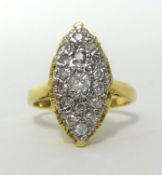 An 18ct 'pave' set diamond cluster ring, approx 19mm x 10mm, finger size O.