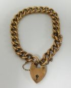 A 9ct gold curb link bracelet with padlock approx 13.3gms.
