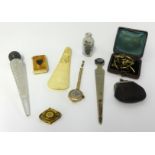 A mixed lot of vesta, yellow metal, gold? Ladies watch part, gilt brooch, silver and glass scent