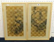 A pair of Chinese silk work pictures of interwoven design depicting birds, 49cm x 24cm.