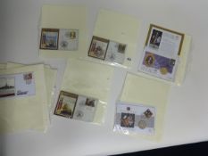 A small collection of Nelson Celebration first day covers and D Day gilt and decorated crowns.