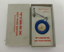 A Timex Tyre watch, key ring model, boxed.