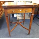 Jas Shoolbred & Co, an Edwardian rosewood and marquetry envelope card table.