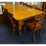 Early 20th Century mahogany dining table, with wind out mechanism and extra leaf on heavy turned