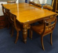 Early 20th Century mahogany dining table, with wind out mechanism and extra leaf on heavy turned