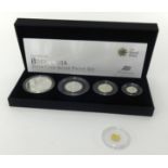 A Gold 2010 Cook Islands 1/2 of a dollar also the Royal Mint cased set Britannia 4 coin silver proof