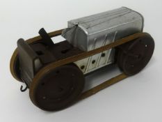 Marx Toys, a tin plate and clockwork tractor.