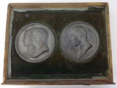 An interesting collection of ten historic metal medallions in recess trays including Napoléon