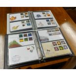 A collection of first day covers in six albums.